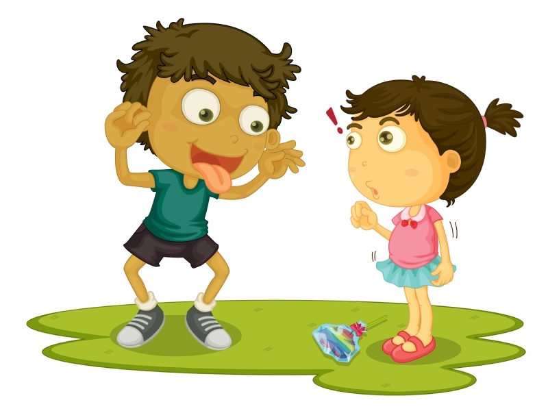 Young boy teasing little girl